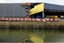 Gold panels are added to the outside of Asda in Hayle. PZGM20140805B-001_C